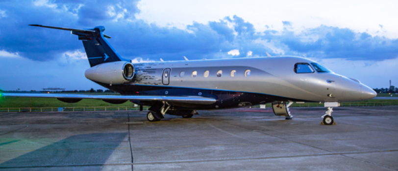 A Mid Size Embraer Preator 600 waiting for their passengers