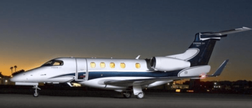 Embraer Phenom 300 light jet exterior on the tarmac