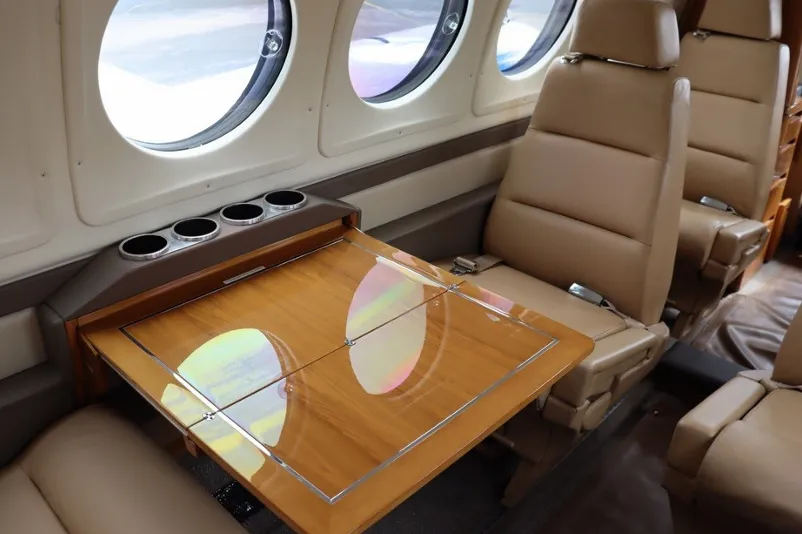 Private jet fold-out table for snacks