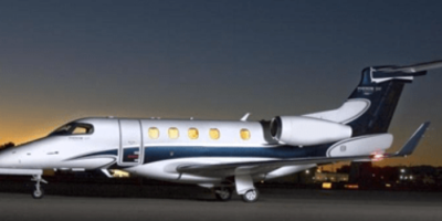 Embraer Phenom at the night parked at the airport
