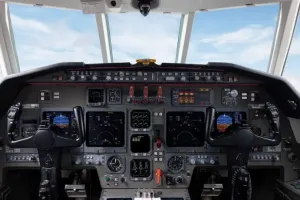 The modern flight deck of the 2002 Falcon 50EX, featuring the Collins EFIS 4000 avionics suite and a clear view from the cockpit